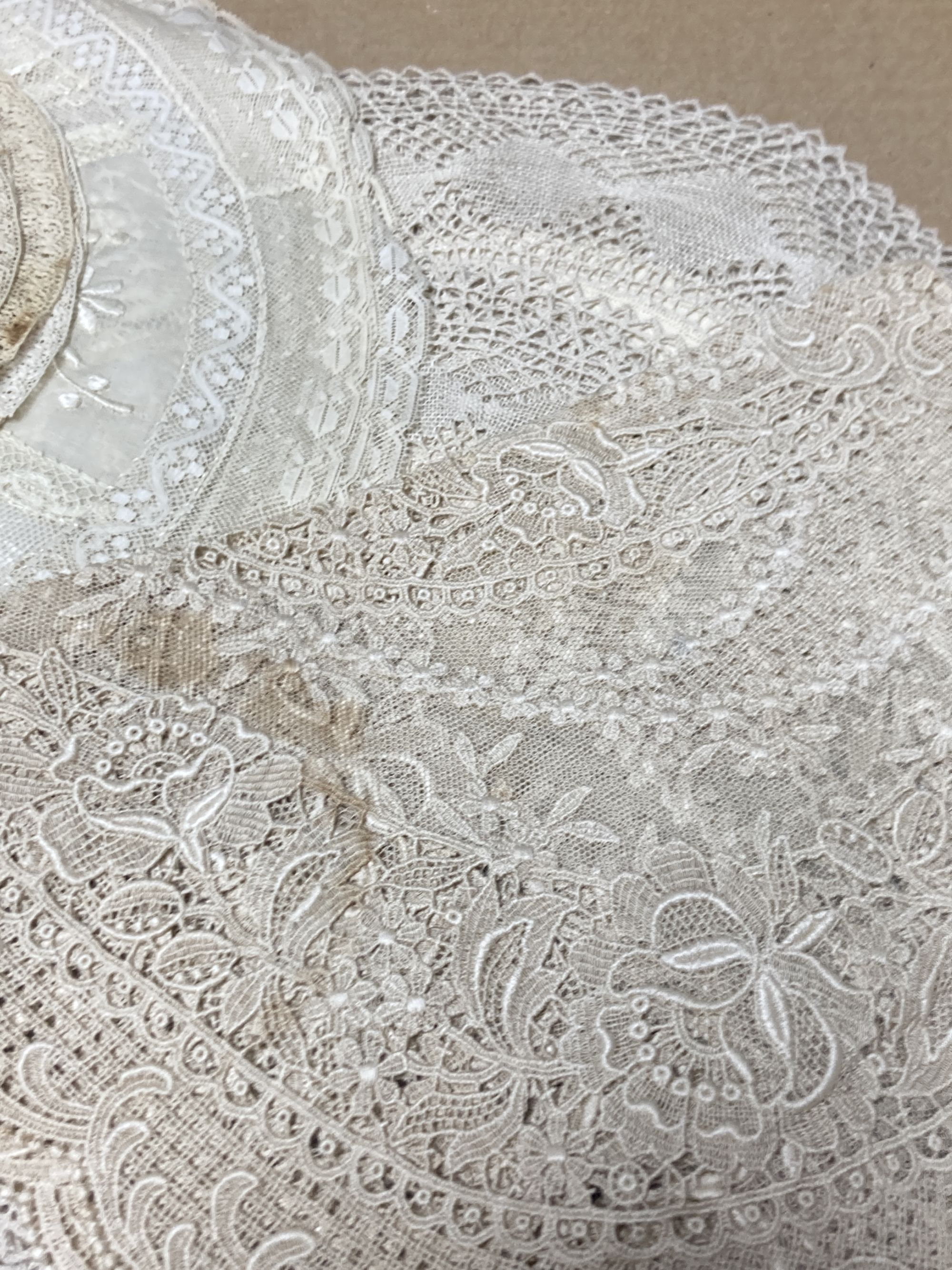 A set of Normandy lace table mats and assorted mats